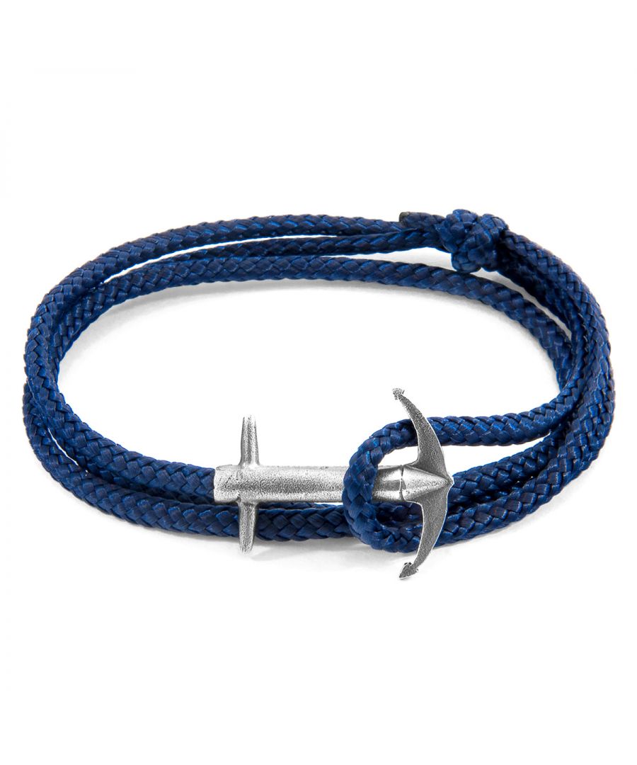 The Navy Blue Admiral Anchor Silver and Rope Bracelet was both designed and skilfully handcrafted completely in Great Britain, In Quality We Trust. For the Modern Journeyman (and woman), ANCHOR & CREW takes ownership of an exploratory lifestyle and enjoys the Happy-Good Life. Combining British craft manufacturing with a discerning modern-minimalist style, this ANCHOR & CREW bracelet features:\n\n3mm diameter performance Marine Grade polyester and nylon rope (GB) \nSecure solid .925 sterling silver anchor (GB) \n\nSIZING\nThis bracelet is one size fits all, with the rope able to extend or tighten to suit your wrist size. To take the bracelet on or off your wrist, simply slide the one adjustable knot around the rope to make the loop size smaller or larger, and once set, keep the loop size consistent and continue wearing by easily unhooking the clasp from the loop. Less is More.