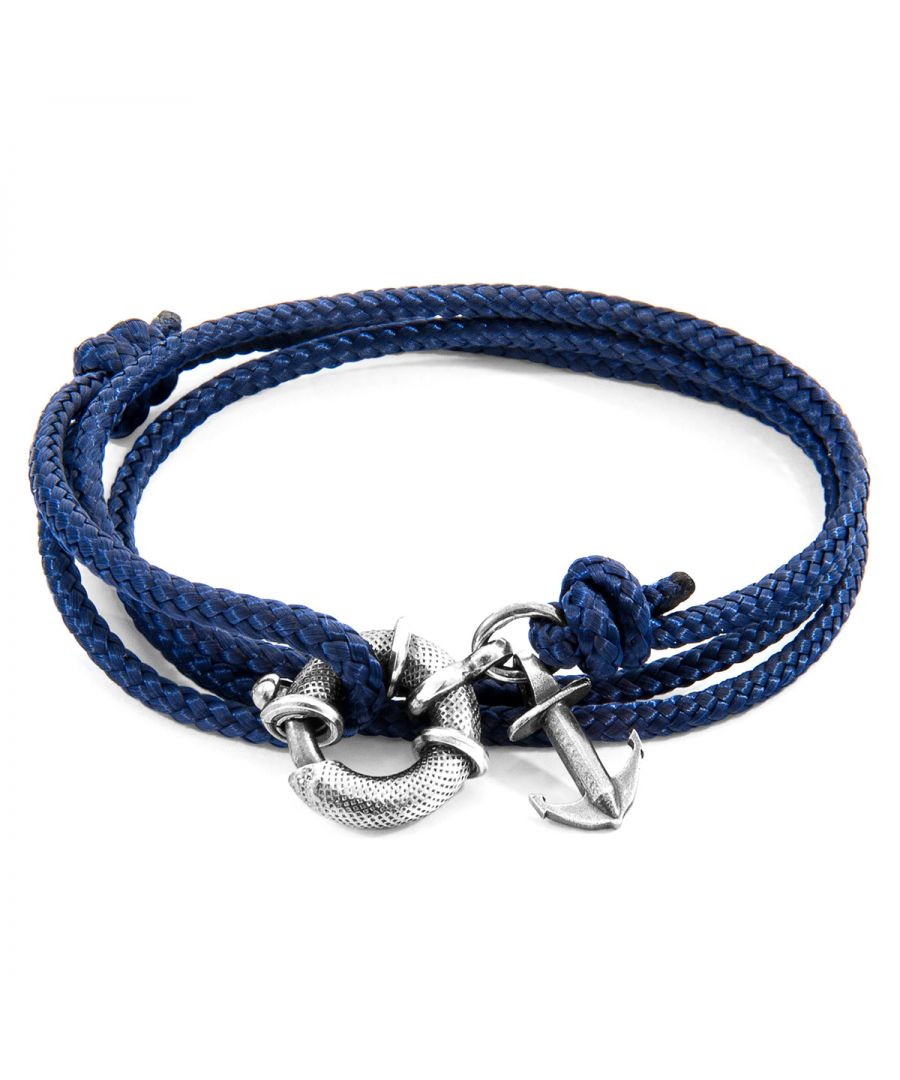 The Navy Blue Clyde Anchor Silver and Rope Bracelet was both designed and skilfully handcrafted completely in Great Britain, In Quality We Trust. For the Modern Journeyman (and woman), ANCHOR & CREW takes ownership of an exploratory lifestyle and enjoys the Happy-Good Life. Combining British craft manufacturing with a discerning modern-minimalist style, this ANCHOR & CREW bracelet features:\n\n3mm diameter performance Marine Grade polyester and nylon rope (GB) \nSecure solid .925 sterling silver lifeboat clasp and drop anchor (GB)  \n\nSIZING\nThis bracelet is one size fits all, with the rope able to extend or tighten to suit your wrist size. To take the bracelet on or off your wrist, simply slide the one adjustable knot around the rope to make the loop size smaller or larger. Once set, keep the loop size consistent and simply slide the latch within the clasp and feed the rope into or out of the toggle.