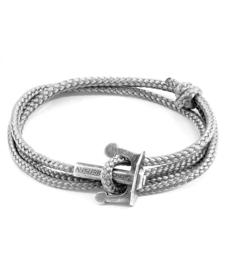 The Classic Grey Union Anchor Silver and Rope Bracelet was both designed and skilfully handcrafted completely in Great Britain, In Quality We Trust. For the Modern Journeyman (and woman), ANCHOR & CREW takes ownership of an exploratory lifestyle and enjoys the Happy-Good Life. Combining British craft manufacturing with a discerning modern-minimalist style, this ANCHOR & CREW bracelet features:\n\n3mm diameter performance Marine Grade polyester and nylon rope (GB) \nSecure solid .925 sterling silver anchor (GB) \n\nSIZING\nThis bracelet is one size fits all, with the rope able to extend or tighten to suit your wrist size. To take the bracelet on or off your wrist, simply slide the one adjustable knot around the rope to make the loop size smaller or larger, and once set, keep the loop size consistent and continue wearing by easily unhooking the clasp from the loop. Less is More.