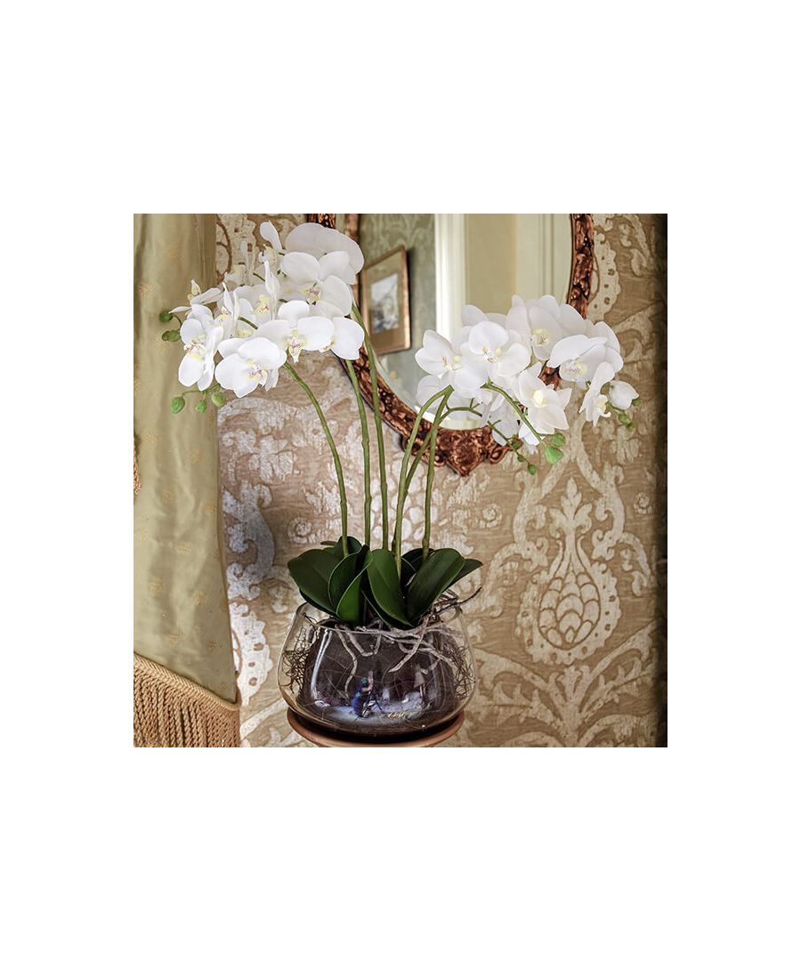The mysterious sophistication of the white orchid is often associated with beauty, purity and elegance, the latter of which is only exacerbated in this realistic faux form. Botany plants lately?\n \nWith researchers recently debunking the myth that faux plants don’t contribute to improved wellbeing, there’s no reason to moss around. Crafted with a careful eye to flora detailing, this orchid arrangement offers a green touch without the pressure of upkeep or stressors to allergies, safe for children and pets.\n \nThe white faux orchid is displayed in this glass fishbowl vase with faux soil. These qualities are presented with a lifelike versatility, allowing you to display the flower in any room and setting across the home.\n \nFeatures: \n\n\nFaux white orchird arrangement\n\n\nLifelike roots\n\n\nGlass fishbowl\n\n\n \nProduct specification: \n\n\nProduct Type: Artificial Plants\n\n\nWeight: 1.82kgs\n\n\nDimensions: H61cm x W24cm x D24cm