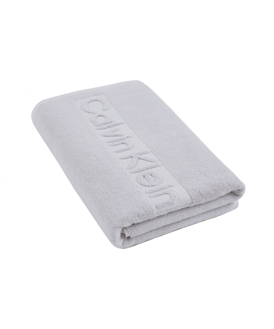 The Calvin klein Sculpted CK Logo Towel Collection is made of fine 629 GSM, and these 100% cotton Sculpted piece dyed jacquard towels feature a bold signature Calvin Klein logo on the smaller edge. Available in a range of colours - White, Nimbus Cloud, Sky, Dark Denim, Reef, Rose, Hyacinth, Sage, Fawn, Pink Terra Cotta