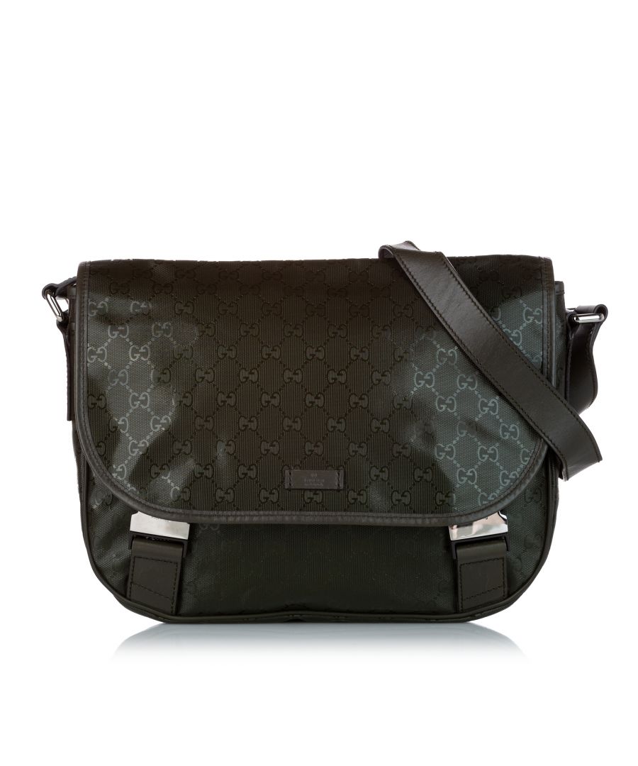 VINTAGE. RRP AS NEW. This crossbody bag features a PVC body with leather trim, an adjustable flat nylon strap, a top flap with dual buckle closures, and interior zip and slip pockets.Exterior Front Scratched. Exterior Back Scratched. Exterior Bottom Out Of Shape. Exterior Handle Out Of Shape. Exterior Corners Worn. Lock Scratched. Metal Attachment Scratched. Exterior Front Scratched. Exterior Back Scratched. Exterior Botton Out Of Shape. Exterior Handle Out Of Shape. Exterior Corners Worn. Lock Scratched. Metal Attachment Scratched. \n\nDimensions:\nLength 27cm\nWidth 32cm\nDepth 11cm\nShoulder Drop 50cm\n\nOriginal Accessories: Dust Bag, Dust Bag\n\nSerial Number: 201732 520981\nColor: Brown\nMaterial: Plastic x PVC x Leather x Calf\nCountry of Origin: Italy\nBoutique Reference: SSU166319K1342\n\n\nProduct Rating: GoodCondition\n\nCertificate of Authenticity is available upon request with no extra fee required. Please contact our customer service team.