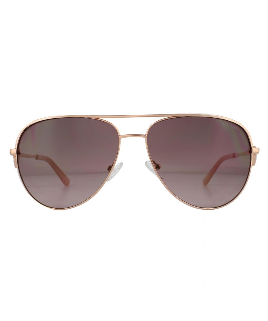 Guess Sunglasses GF6106 28T Rose Gold Bordeaux  are a feminine aviator design embellished with a metal heart framed with sparkling diamantes and engraved with the Guess logo.
