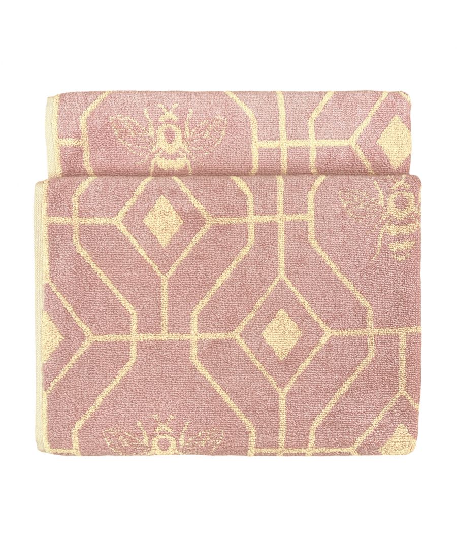 Make your bathroom buzz with the Bee Deco Bath Towel. Featuring a honeycomb inspired geometric design with buzzing bumble bees, this 100% Turkish cotton bath towel is the perfect addition to any modern, colour-loving home! This product is certified by OEKO-TEX® showing it has been sustainably made.