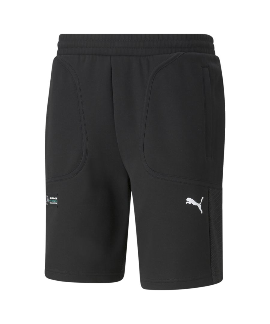 We're bringing motorsport flair to classic athletic sweat shorts, combining a comfy elasticated waist and casual sweat fabric with sweeping cut lines and auto-inspired twin stitching at the pockets. Dual PUMA and Mercedes-AMG Petronas Motorsport F1 branding at the legs complete the sweatstyle-meets-motorsport look. Executed in Forever Better Initiative cotton and recycled polyester for better sustainability. FEATURES & BENEFITS Contains Recycled Material: Made with recycled fibers. One of PUMA's answers to reduce our environmental impact. DETAILS Regular fitSide pockets with pocket frame detail with twin needle stitchingElasticated waistband with internal drawcordOrganic curved cut linesMercedes-AMG Petronas Motorsport F1 branding at right legPUMA Cat Logo at left leg