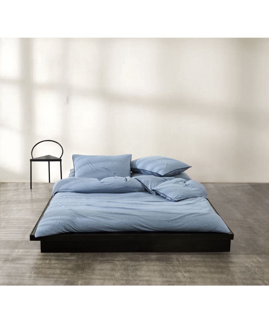 Adorn your sleep space in a timeless style with the Logo Essentials Duvet Cover from Calvin Klein. This supremely soft and luxurious Modern Cotton bedding in Dusk colour is finished with a Midnight colour logo piping around all four sides on the duvet cover and the pillowcase, which brings a cosy and sophisticated aesthetic to your bedroom. Available in stone and dusk colours.