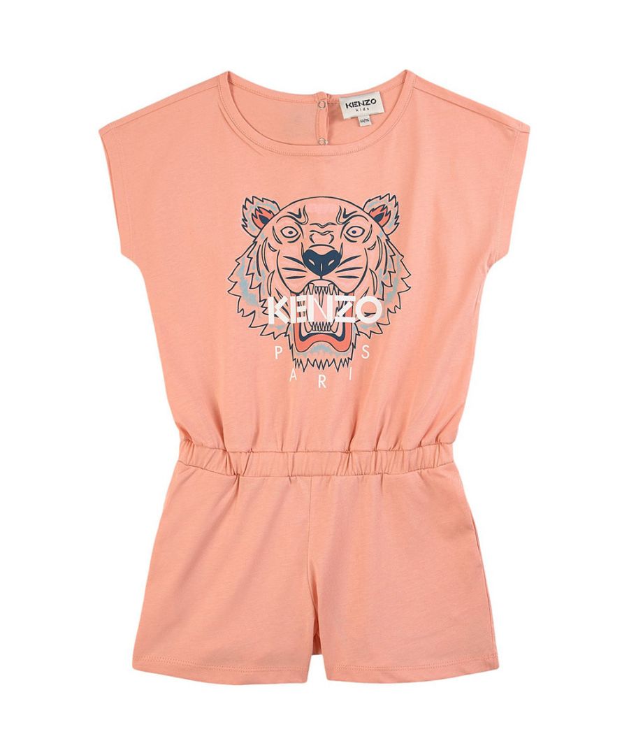 This Kenzo Girls Jumpsuit in Pink romper has snap buttons at the back. It has an elasticated waist.\n\nSnap buttons\nElasticated waist\nTiger logo