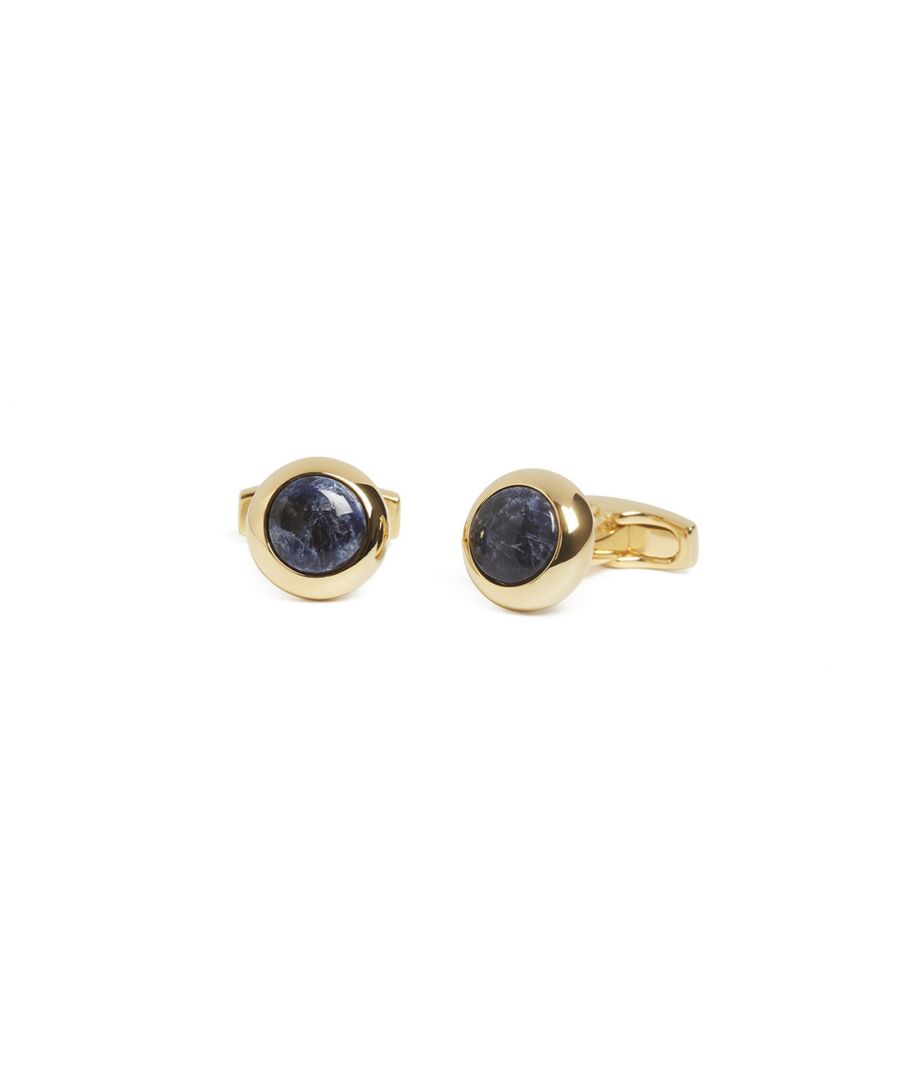 Gatsby in sodalite, with its mysterious depths, is inspired by a design from the 1960s. Simple, elegant and classy, a polished 'doughnut' of rose gold plated metal encloses a dome of deep blue, mysteriously marbled sodalite. Different qualities of reflected light play off each other. The cufflink also has a nice weight to it. A direct, clean design which I am rather pleased with