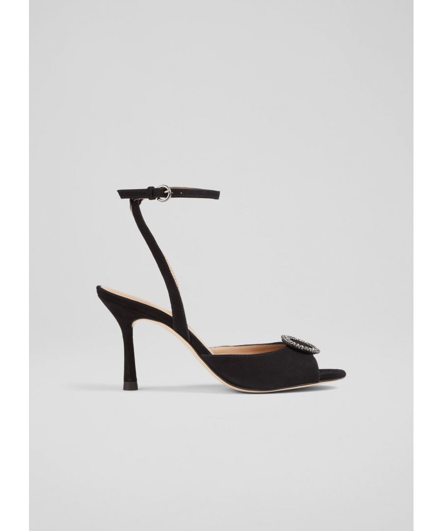 An elegant and timeless take on a party sandal, our Belle sandals have a glamorous, vintage feel. Crafted from super-soft black suede, they're a peeptoe style with a sparkling, oval-shaped crystal buckle embellishment, a delicate ankle strap and a shapely stiletto heel. Wear them with your favourite party dresses or to instantly dress up a pair of tailored trousers.