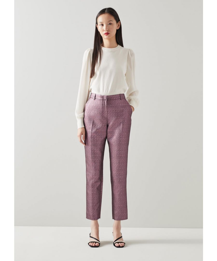 Party trousers don't come glitzier than our Issy trousers - they're perfectly tailored, beautifully shimmery and lots of fun. Crafted from a pink sparkling tailored fabric, they sit on the waist, have a concealed zip fastening and belt loops, side pockets, back welt pockets, a slim fit with pressed centre creases and they're cropped at the ankle.  Wear them with a frilly blouse by day and something silky by night.
