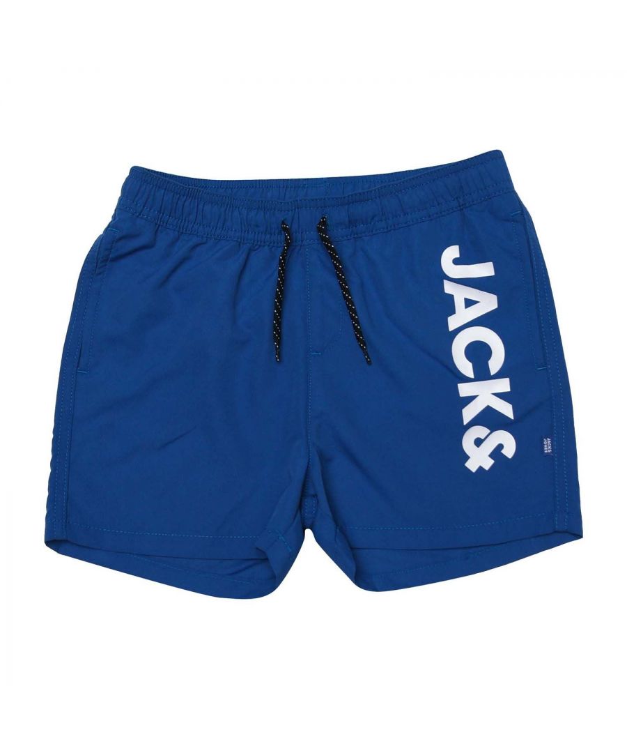 Junior Boys Jack Jones Aruba Swim Shorts in blue.-Elasticated drawcord waist.- Two slip pockets.- Mesh inner brief.- Printed branding.- Quick drying fabric.- Shell: 50% Polyester  50% (Recycled). Lining: 100% Polyester.- Ref: 12190191A