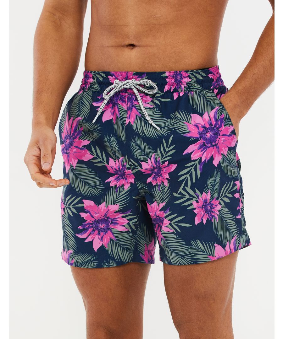 These swim shorts from Threadbare are made of quick-drying, recycled polyester with a mesh liner. They feature an elasticated waistband with adjustable drawstring and 2 side pockets. Perfect for the beach or by the pool. Other colours and prints available.