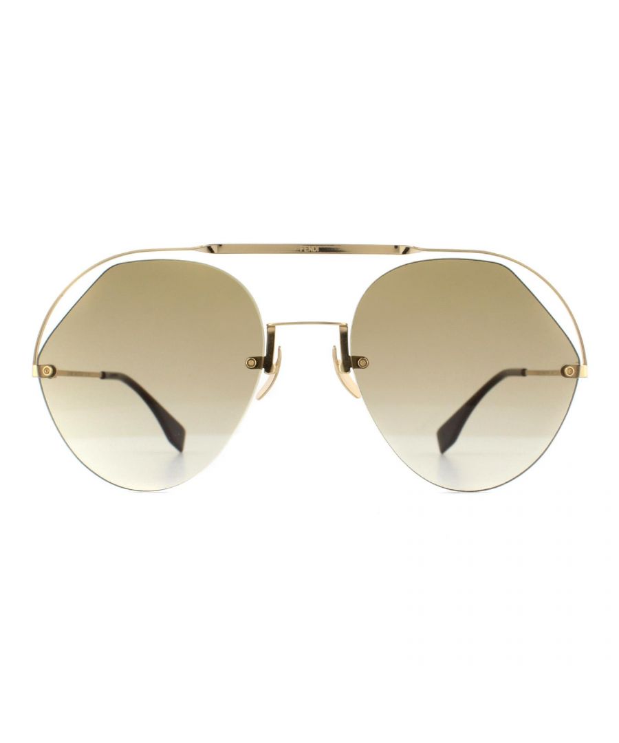 Fendi Sunglasses FF 0326/S 09Q HA Gold Brown Gradient are luxurious statement sunglasses with pilot shaped lenses and a dramatic and contemporary double bridge made from flat metal. Metal temples feature embossed logos and are tipped with acetate for comfort.