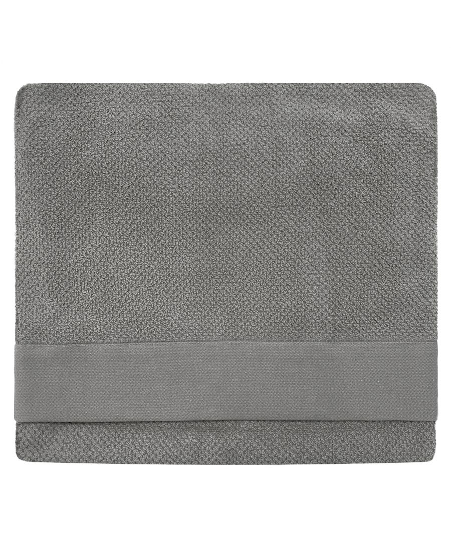 Accessorise your bathroom with the simplistic yet chic textured bath sheet. Made from 100% Cotton, this design features an Oxford panel trim and is also quick-drying and super absorbent. This product is certified by OEKO-TEX® showing it has been sustainably made.