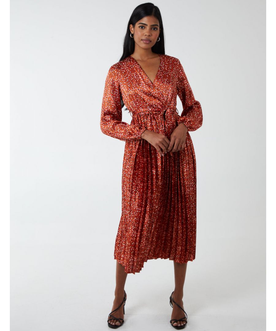 Nothing looks more elegant than combining a pleated bottom with a wrap front and a waist belt. It's beautiful, flattering, and gives you the versatility you want in a dress depending on whether you are going to work or a dinner party. Style with heels.