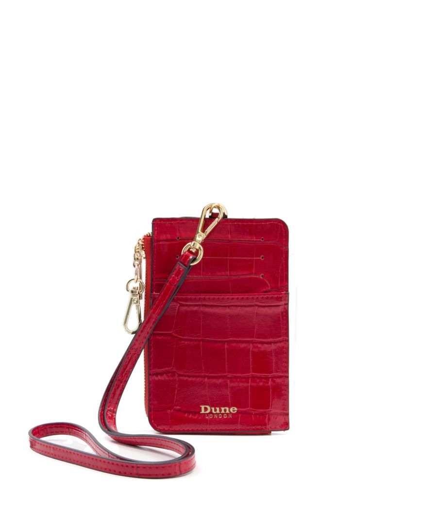 Stanton combines style with practicality, allowing you to carry your cards and change hands-free. This slimline piece has a chic croc-effect and a long strap to be worn around your neck. Just want Stanton for your handbag? Detach the strap easily usi