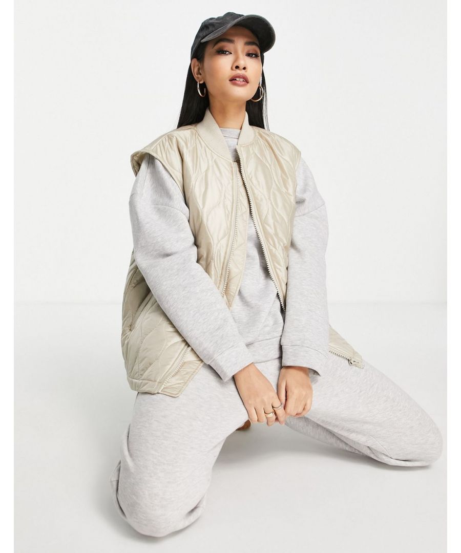 Gilet by Topshop Throw-on appeal Baseball collar Sleeveless style Zip fastening Side pockets Oversized fit  Sold By: Asos