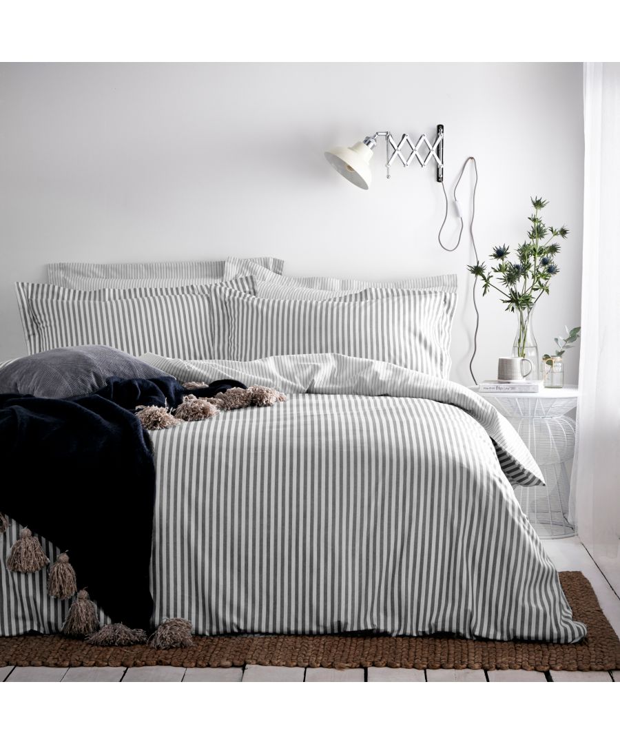 This duvet cover set is both a contemporary and classic addition to your home. The reversible subtle mélange print provides a luxurious woven striped appearance. The included matching pillowcases creates a simple yet relaxed look with their Oxford Borders; alongside the reversible stripe design that adds an effortless relaxed look to your bedroom. Choose your favourite side to fit with your style or flip sides to give your bedroom a midweek refresh. Single size includes one matching pillowcase measuring 50 x 75cm (20