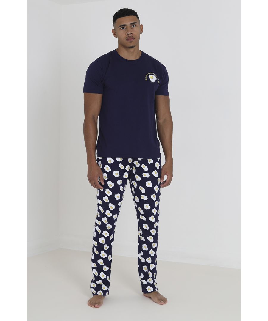 Get ready to relax in this two-piece loungewear set from Brave Soul. This cotton pyjama set has a short sleeve, crew neck top with an egg print on the left chest and an all-over fried egg print, long bottoms designed in a regular fit. The trousers have an elasticated waistband and are made in a soft cotton fabric for extra comfort.