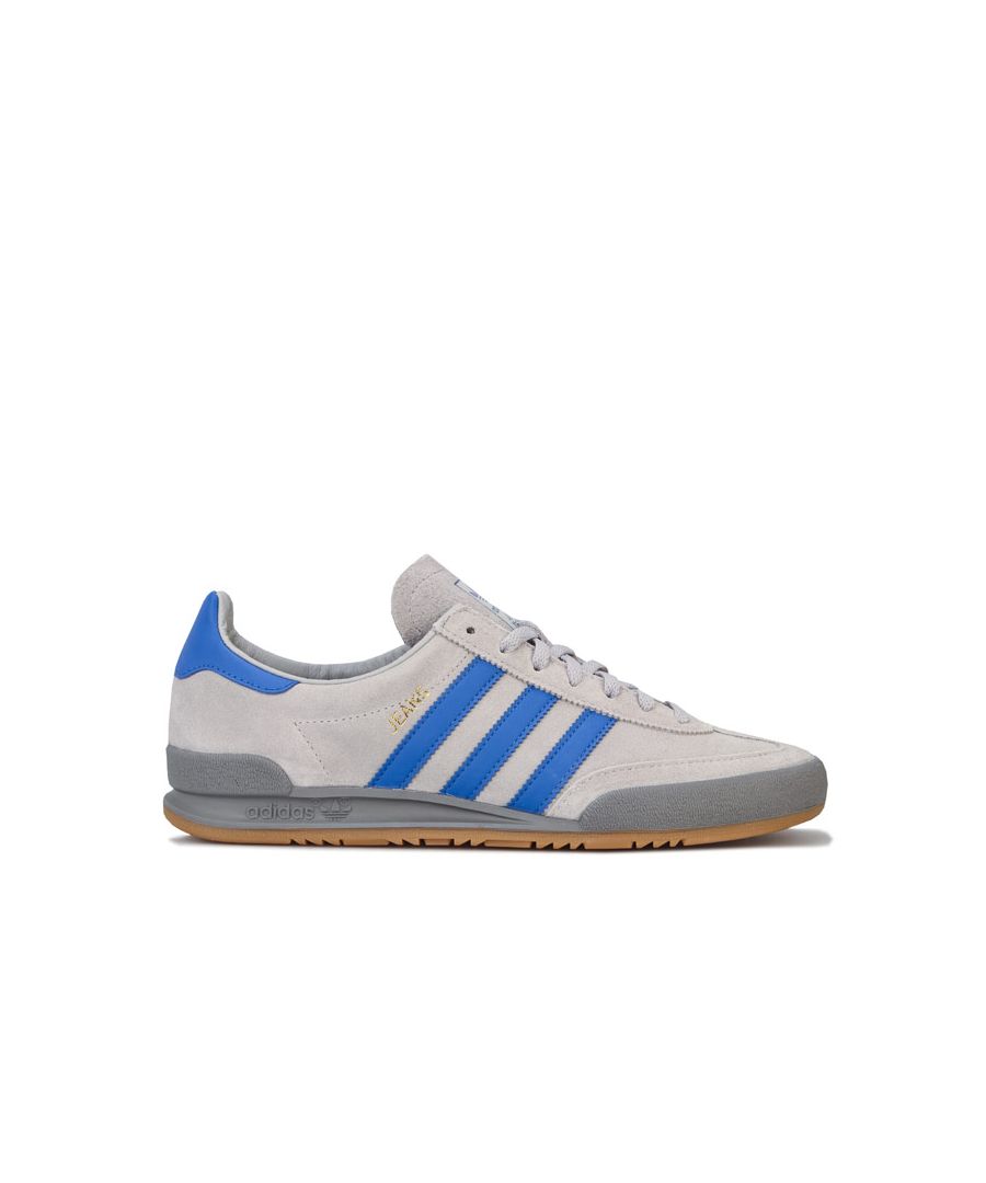 Mens adidas Originals Jeans Trainers in grey two - hi-res blue - grey three.<BR><BR>- Premium suede upper.<BR>- Lace closure.<BR>- Leather lining to heel.<BR>- Comfortable textile lining.<BR>- Padded collar.<BR>- Printed Trefoil logo to tongue.<BR>- Contrast 3-Stripes to sides with foil print ‘Jeans’ wordmark.<BR>- Contrast heel patch.<BR>- Removable cushioned insole.<BR>- Gum rubber outsole with Trefoil logo tread pattern.<BR>- Suede upper  Leather and textile lining  Synthetic sole.<BR>- Ref: CQ2769