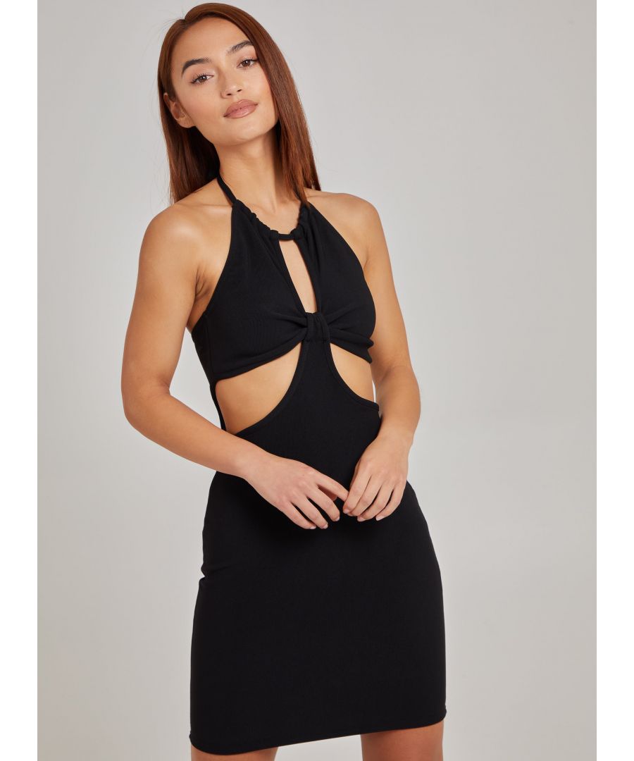Feel sexy in this Cut Out Halterneck Mini Dress! The oerfect LBD for the summer season. 95% Cotton, 5% ElastaneMade in UKWash With Similar ColoursIron On ReverseDo Not Dry CleanModel wearing size 6Model height: 5â€™6â€ /167cm