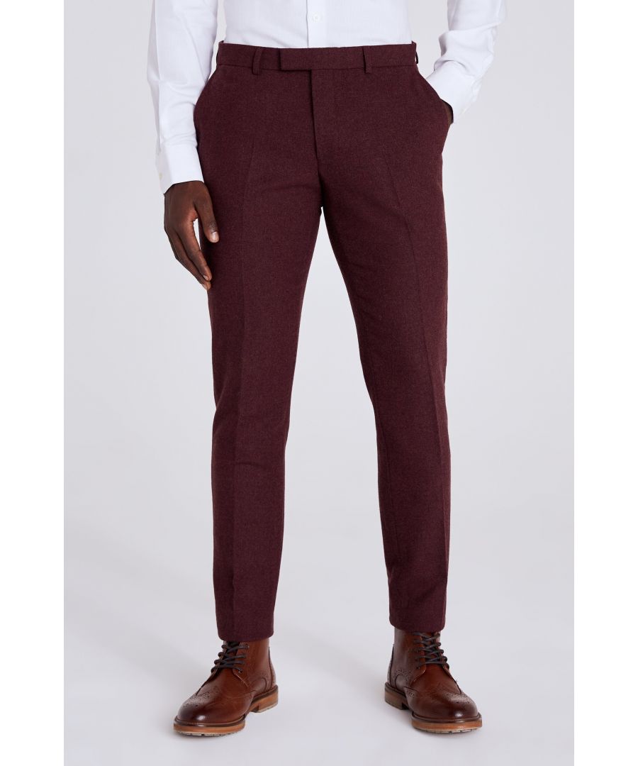 Cut to a slim fit for a pin-sharp profile, Moss' tweed trousers are crafted in a wool blend woven with Donegal-style flecks. The fig tone is great for autumn/winter looks â€“ but you can freshen it up with pinks and blues for spring racedays and weddings.