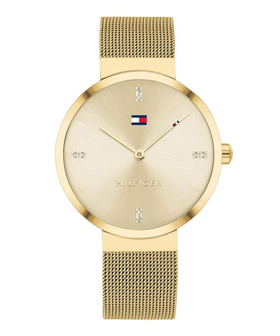 This Tommy Hilfiger Liberty Analogue Watch for Women is the perfect timepiece to wear or to gift. It's Gold 35 mm Round case combined with the comfortable Gold Stainless steel watch band will ensure you enjoy this stunning timepiece without any compromise. Operated by a high quality Quartz movement and water resistant to 3 bars, your watch will keep ticking. This fashionable, classic watch is a perfect gift for New Year, birthday,valentine's day and so on High quality 19 cm length, 16 mm wide, Gold Stainless steel strap with a Fold over clasp Case diameter: 35 mm, Case height: 7 mm and Case color: Gold Dial color: Gold