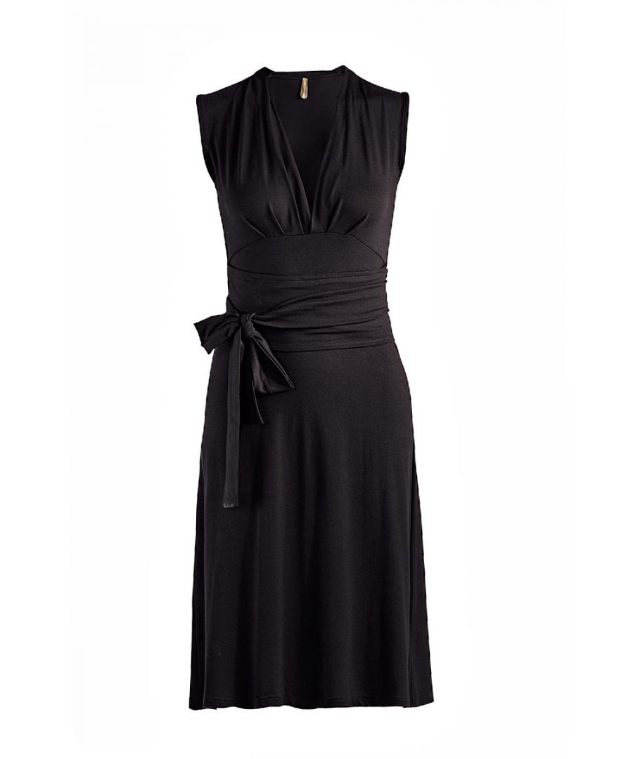 Summer dress in solid colour stretch jersey fabric. Sleeveless with a deep V neckline with pleats on the left and right. Seam detail under the bust with pleats underneath. Belt in the same fabric fastened at the sides. Empire line with an A line silhouette. Knee length.