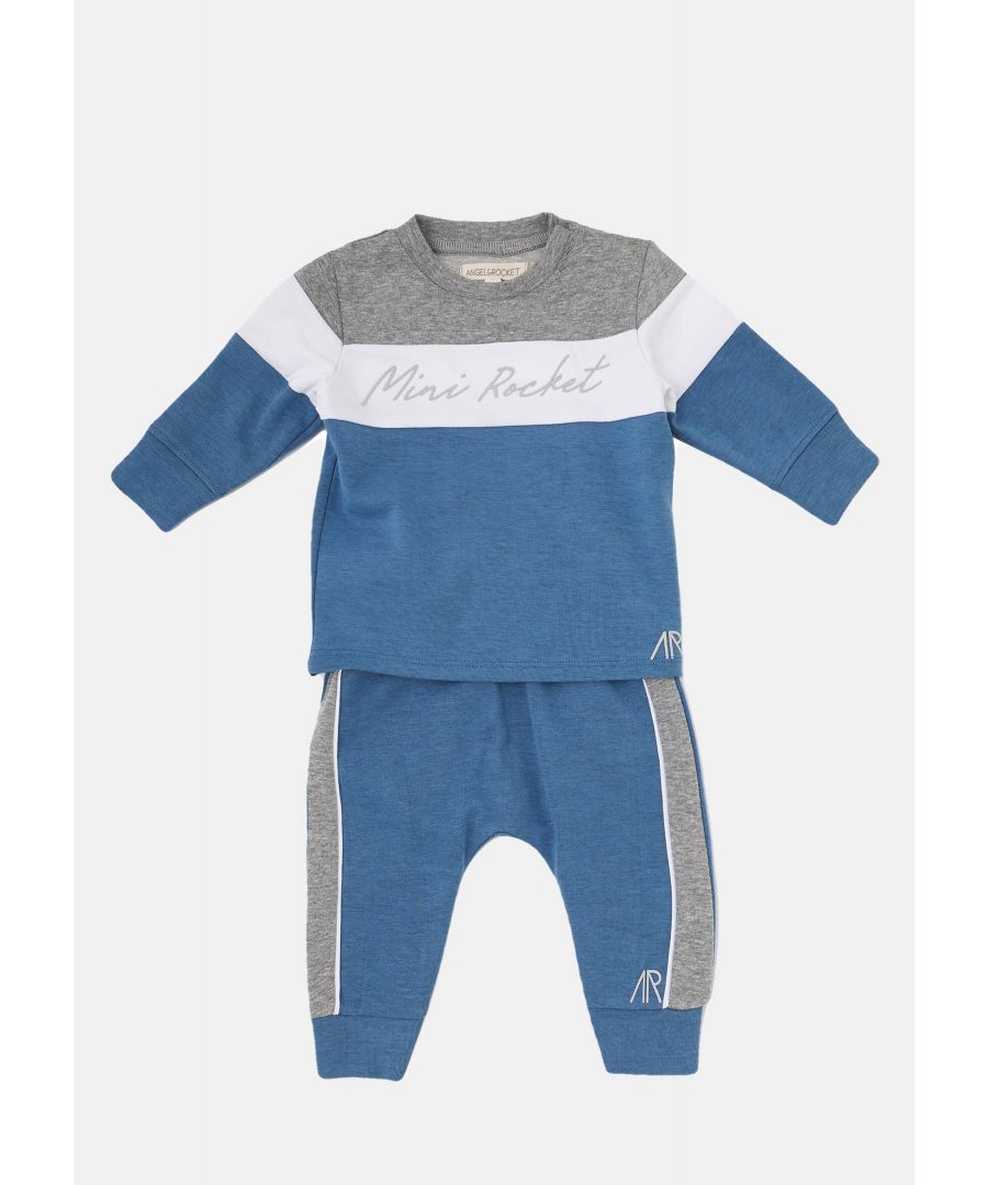 Comfy sweat sets are the ideal outfit for the 'mini rebel' boys  the tonal blue colour block design helps create the ideal outfit.  Angel & Rocket cares - made with fairtrade cotton.  Colour: Blue  About me: 100% cotton  Look after me: think planet  machine wash at 30c      