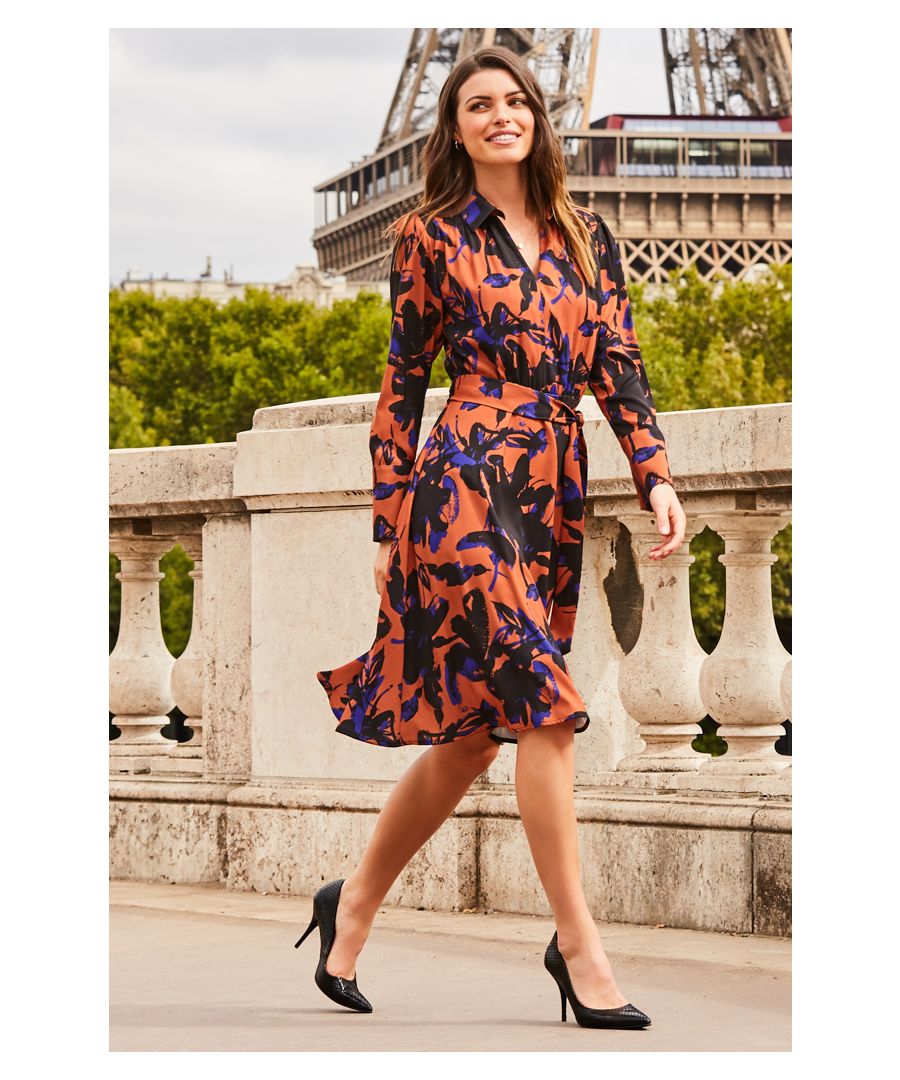 REASONS TO BUY:\n\nThe new way to wear florals\nWaist-accentuating belt tie\nSexy open neck detail\nOn-trend autumn colour palette \nGo classic with courts or stand out with metallic ankle boots