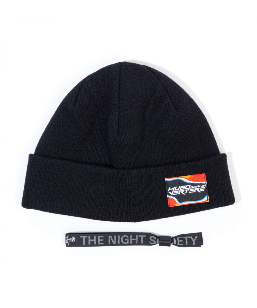 Seal off your streetwear look with this trend driven beanie hat from the HUGO x Vertere Berlin collaboration inspired by Berlin nightlife and the DJ\'s who make it. Knitted from a blend of virgin wool and cotton providing a super soft hand feel and features a turned up cuff. Finished with an exclusive logo patch.One Size, Knitted Virgin Wool & Cotton, Turned Up Cuff, Exclusive Logo, HUGO x Vertere Berlin Branding.