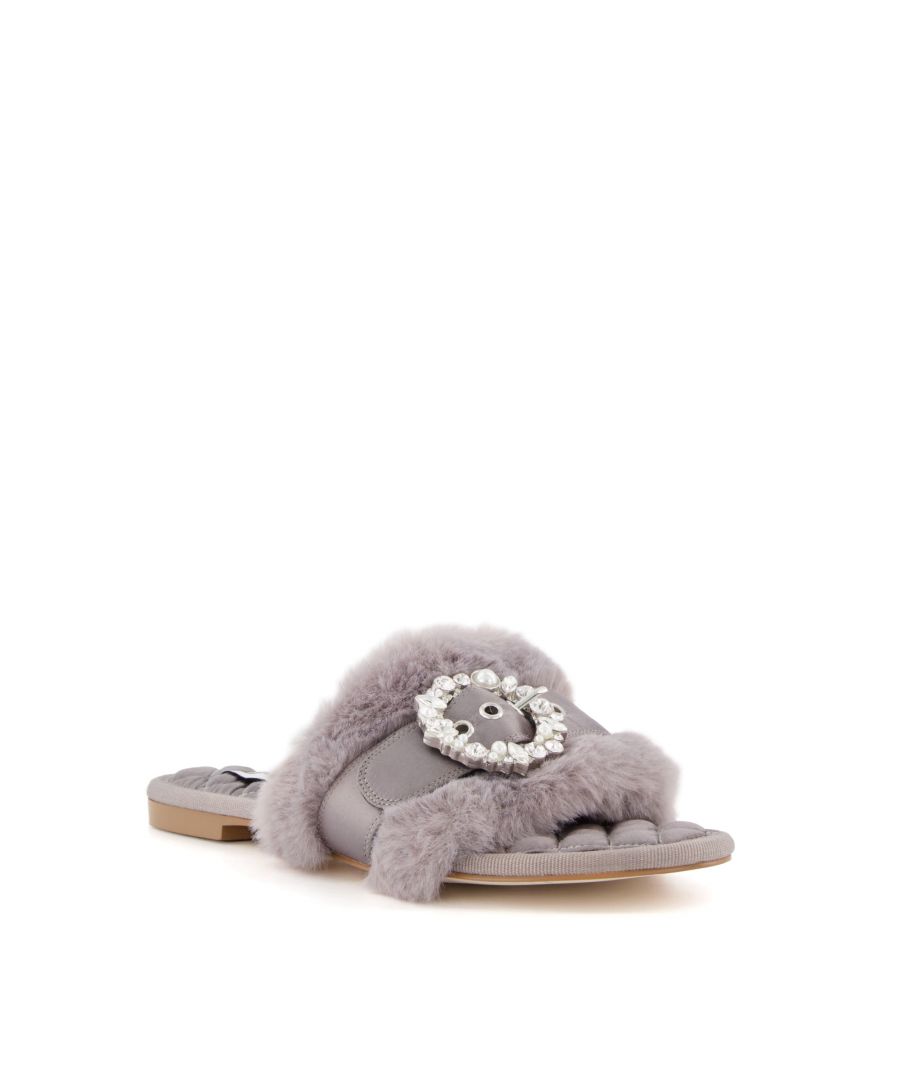 Our Wisteria slippers provide a more luxurious way to lounge. The slider silhouette is coated in glossy, quilted satin and beautifully soft faux fur. Gem-embellished buckles add some necessary sparkle