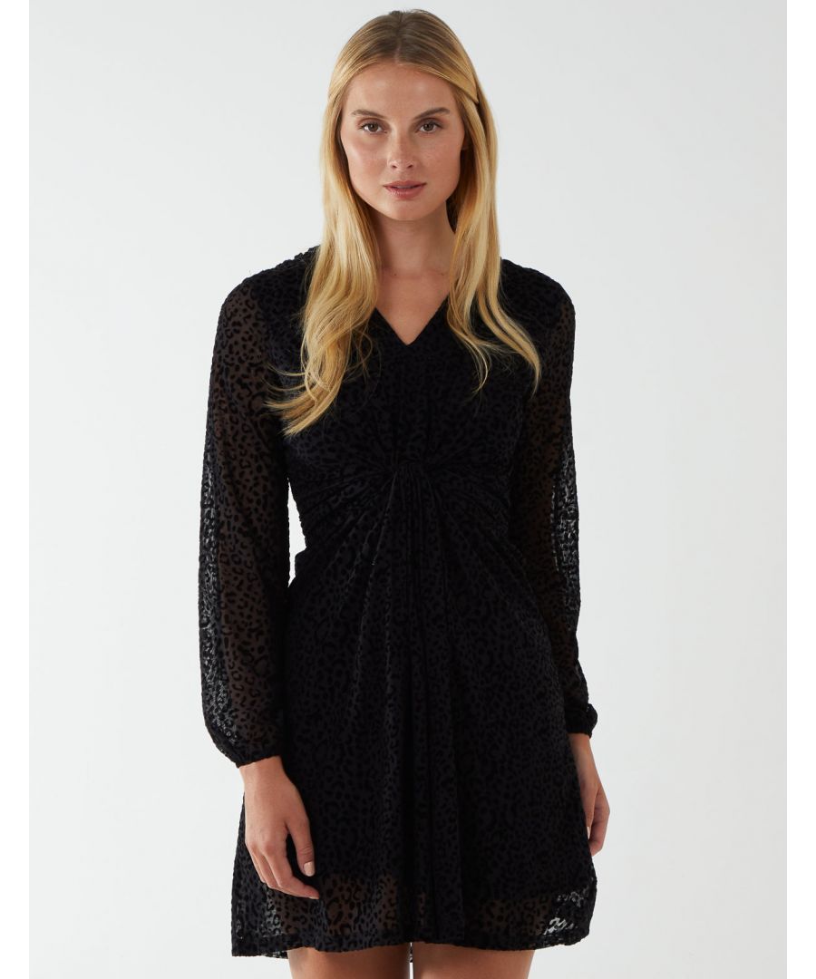 Meet the Leopard Print Flocked Knot Front Angel Sleeve. A beautiful and versatile dress that can be worn at your workplace, casual drinks with your friends or a special event. This dress features a knot front, a mesh top layer and a v-neckline. Gorgeous, elegant and perfectly matched with heeled shoes.
