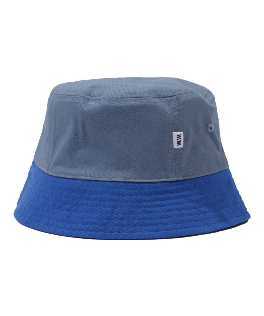 Wood Wood provides not only protection, but style and variety with it. This reversible bucket hat comes in a colour block design and a classic silhouette, the ultimate summertime accessory. Crafted from a twill cotton, with embroidered air vents. Regular Fit, Bucket Hat, Double Sided, Colour Block Design, Embroidered Air Vents, Pure Cotton, Wood Wood Tag.