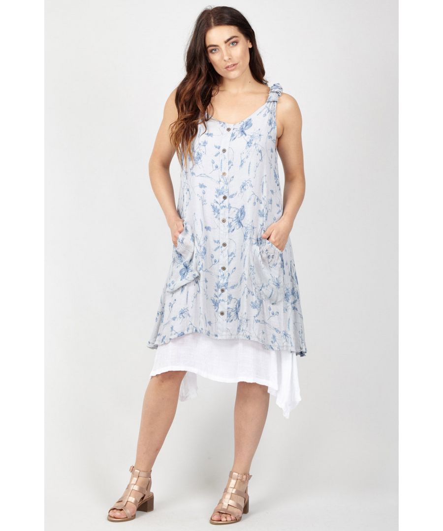 Opt for a girly dress in the Summer days with this floral layered dress. Featuring a round neck, thick cami straps and layered hem. Wear with sandals and a light jacket.