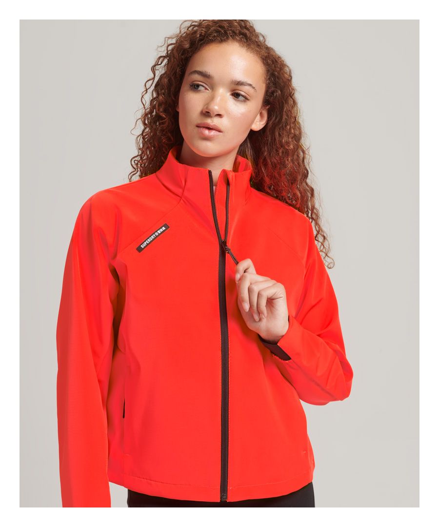 Rain or shine, the Tech Softshell Track jacket is your perfect layering option for the activewear aesthetic. Confidence at it's best in this versatile jacket all year round.Relaxed fit – the classic Superdry fit. Not too slim, not too loose, just right. Go for your normal sizeZip fasteningTwo front zip pocketsElasticated cuffsDrawstring hemSuperdry logo patch