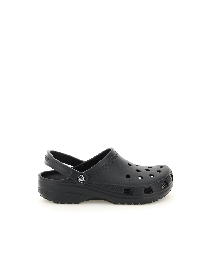 Classic CROCS sabot made with light and resistant material. Round toe design with holes on the upper, movable strap on the back with logo button detail on the sides. Inside with comfort crocs technology. Rubber outsole.