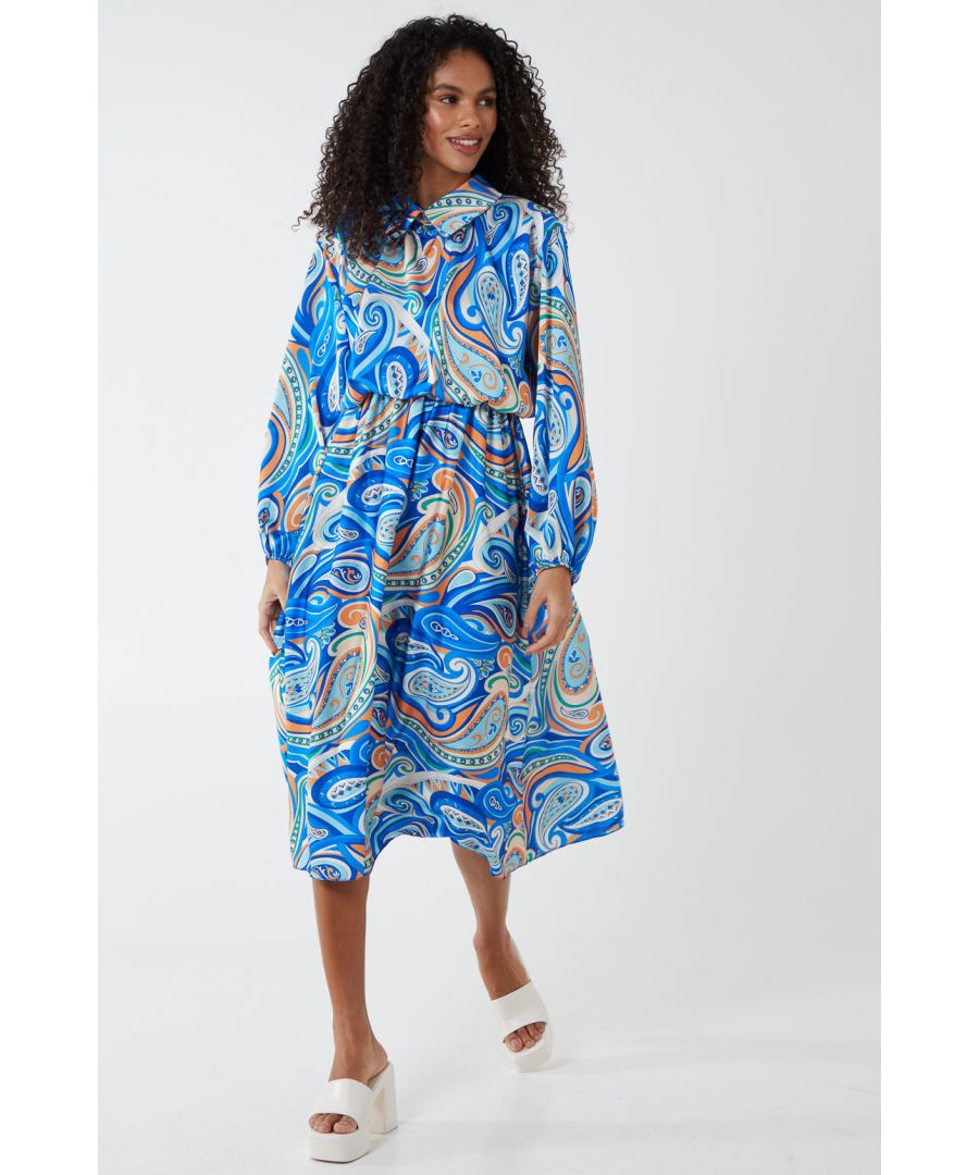 A wardrobe stunner, this midi dress is perfect for looking glamorous on any occasion. With a paisley print, elasticated waist and flare skirt design. Accessorize with fine earrings and pump shoes and be office ready. Outer: 95% Polyester, 5% Elastane. Inner: 100% Viscose. Made in Italy. Machine washable.  Collar neck line. Long sleeve. Button back. Approx. length 112 cm. Bust 45 cm. This Dress comes in ONE size that fits UK 8-14. Model height: 5'8