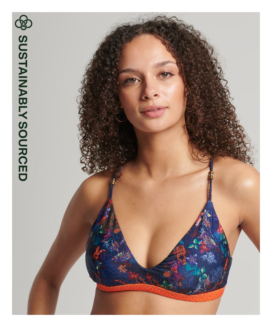 Add a creative flair to your beach outfit with our Vintage Tropical Bikini Top. Inspired by retro California vibes, you can feel confident and comfortable with its intricate braided design.All over printBraided straps with metal beadsSelf tie backRemovable padded cupsMetal Superdry tabPlease note due to hygiene reasons, we are unable to offer an exchange or refund on swimwear unless they are sealed in their original packaging. This does not affect your statutory rights.By 2050, there will be more plastic in the ocean than fish.Help save plastic from polluting the earth. Wear this instead.This new swimwear fabric is made from 80% recycled post-consumer waste.#GrowFutureThinkingMulticoloured tropical print against an authentic coral