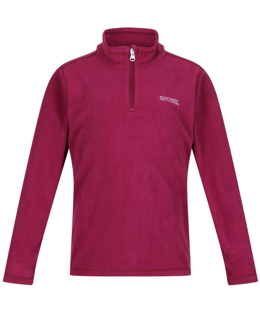One of our best selling fleece styles across the seasons, the kids' Hotshot II Overhead Fleece is made of super soft and lightweight Symmetry fleece with an anti-pill finish to keep it looking fresh wear after wear. The funnel neck offers extra warmth and the quarter zip fastening makes for easy on-off. Pop it over T-shirts or layer under their coats on colder days. With the Regatta embroidery on the chest.