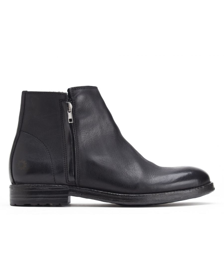 This ankle boot from Base London has been crafted from soft leathers by the finest Portuguese boot makers and hand finished with a rich burnished look. Two functional zips provide easy access and a durable resin sole with a cleated tread will provide a confident step through winter months.