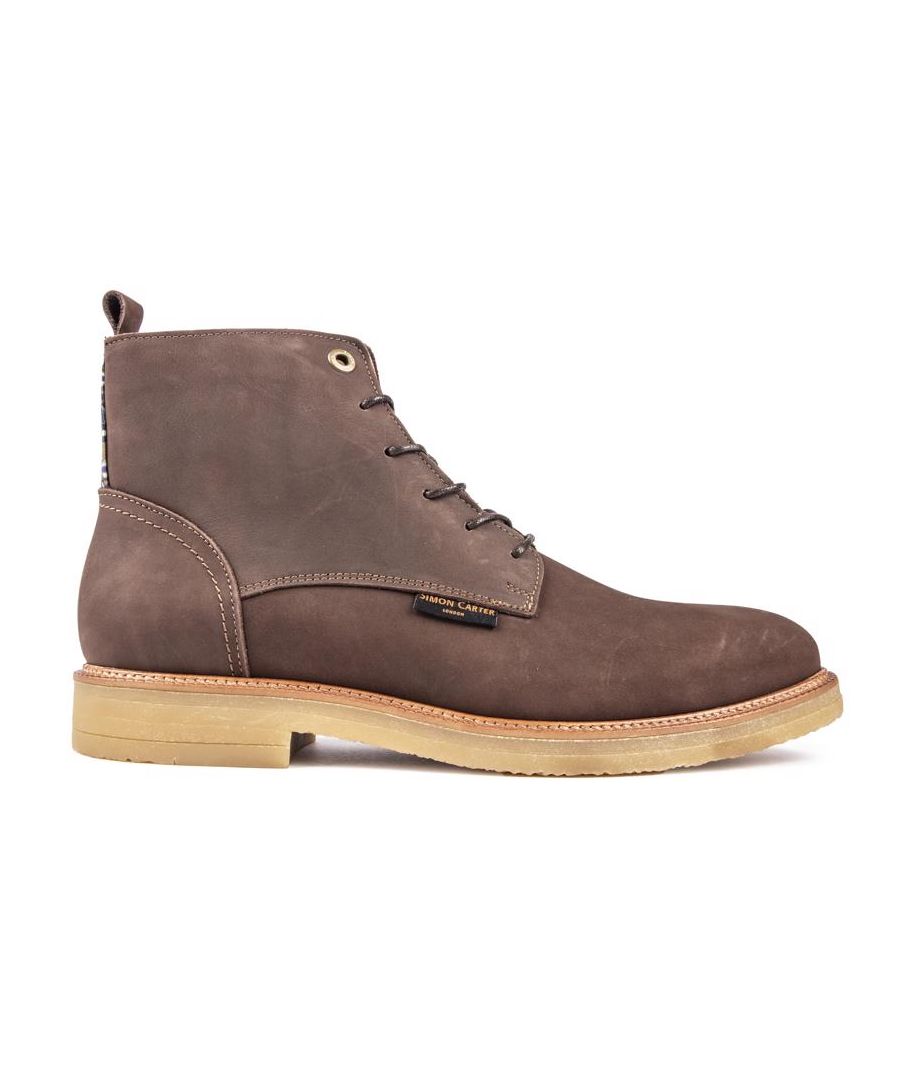 The Parrot Boot By Simon Carter Is A Stylish Chukka Boot, Complete With Branded Metal Eyelets, Leather Heel Tab And Exclusive Marble Print Lining. Exclusive To Sole Under Licence From Simon Carter, Ensuring That You Will Not Find Them Anywhere Else! These Sleek Brown Boots Have A Premium Leather Upper, Rubber Sole And Luxurious Designer Details.