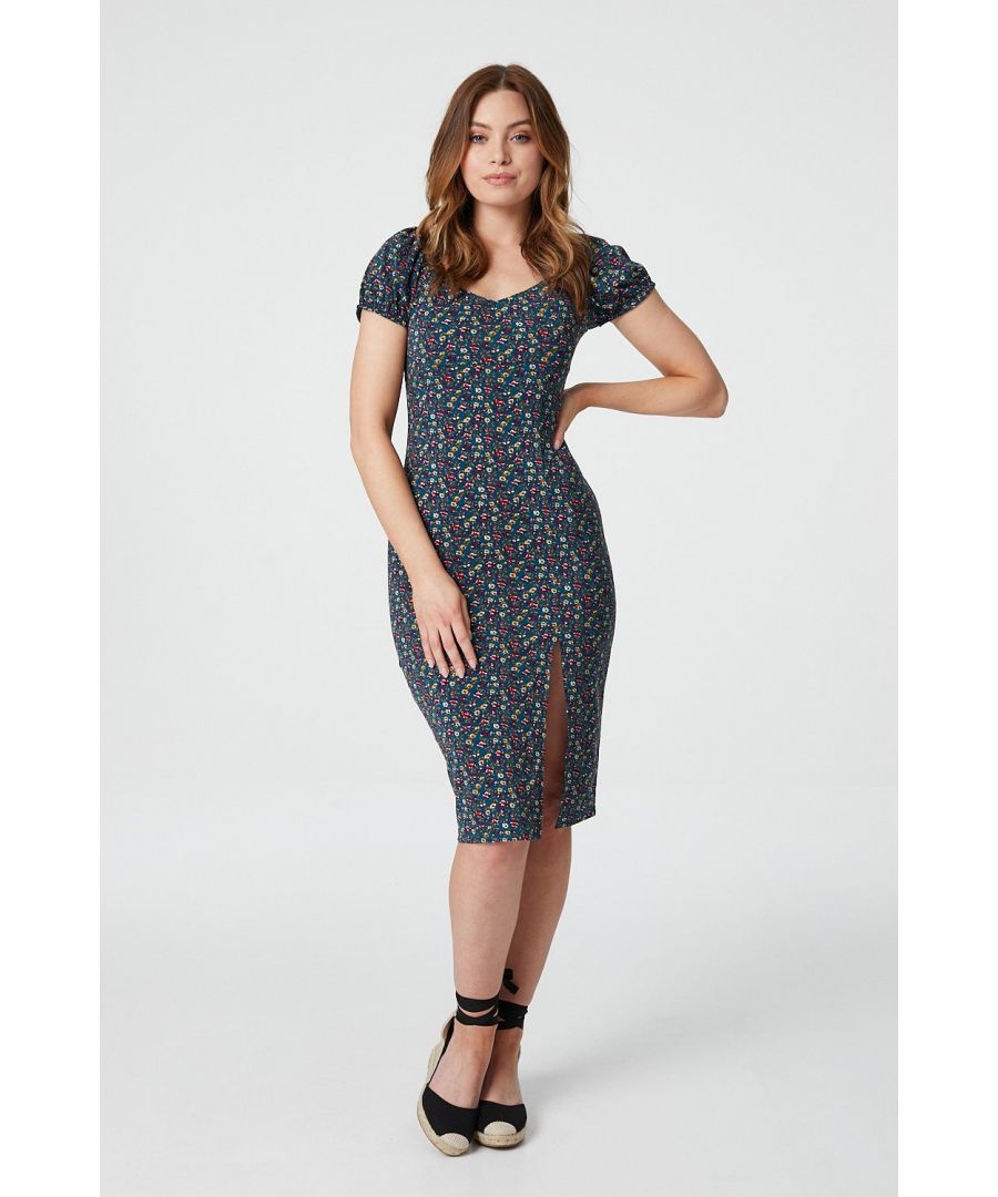 Add a statement floral bodycon dress to your dress collection. With a sweetheart neckline, short demi puff sleeves, a fitted body and a dramatic front split, in a knee length fit. Pair with espadrilles for a polished yet comfortable wedding guest look.