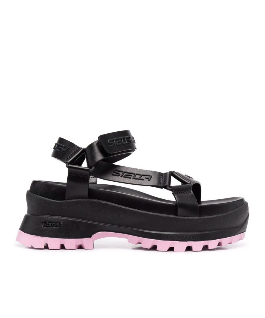 - Composition: 100% Polyethylene - Rubber sole - Velcro strap closure - Relief logo detail - Made in Italy - MPN 810009 W1CUO_1000 - Gender: WOMEN - Code: SHO EY 2 SN 03 O41 W3 T