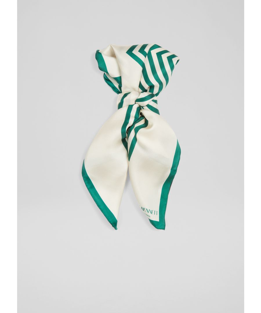 A Sixties-inspired silk scarf with a fun, graphic print, our Nicole scarf brings fresh colour to any spring look. Crafted from luxurious silk in green and cream, it's a classic square style with a frame print. Wear it knotted at the neck or tied to your handbag.