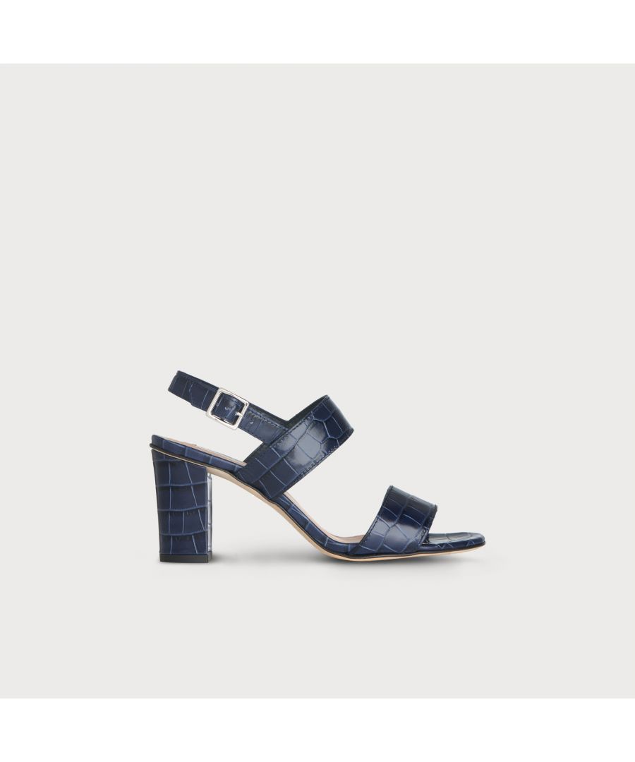 The perfect pair of wear-with-anything summer sandals, Rhiannon is crafted from crocodile-effect leather in versatile navy blue. This two-strap style is super-comfortable for everyday thanks to the mid-height block heel and the buckle-fastening back strap. Wear Rhiannon with your favourite summer dresses when the sun shines. 