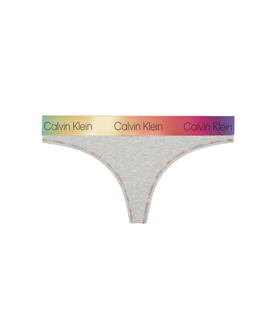 The Pride lingerie line helps support LGBTQ+ organisations and the wider community through timeless Calvin Klein designs and helping promote diversity. The Pride collection boasts the Calvin Klein athleisure look blended with the iconic LGBTQ+ rainbow colours, so you can feel proud in your Pride Calvins! This thong flaunts the Clavin Klein signature branded waistband for a statement designer look. The classic medium rise waist and minimal coverage design add to the sexy style. Made from a soft stretch cotton blend fabric this thong offers the utmost comfort that is perfect for everyday wear. Complete the coordinated look with matching items available from the Pride range by Calvin Klein.\n\nIconic Calvin Klein logo waistband\nIncorporated rainbow colours\nSupporting LGBTQ+ organisations\nSoft stretch jersey fabric\nSexy minimal coverage\nMedium rise waist\nComposition: 53% Cotton | 35% Modal | 12% Elastane\n\nListed in UK sizes