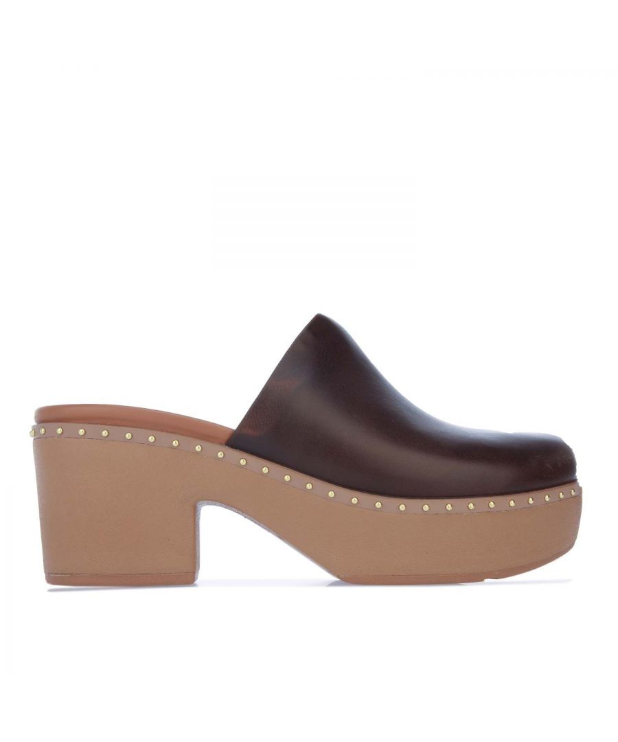 Womens Fit Flop Pilar Mule Leather Clogs in chocolate.- Rich butter-soft leather uppers.- Slip on closure.- Shiny micro-stud detailing around the sole.- Chunky heels.- New ergonomic Cush XTM midsole.- Soft cushioning inside a firmer shell and contoured footbeds.- Slip-resistant rubber outsole.- Ref.: BK5167