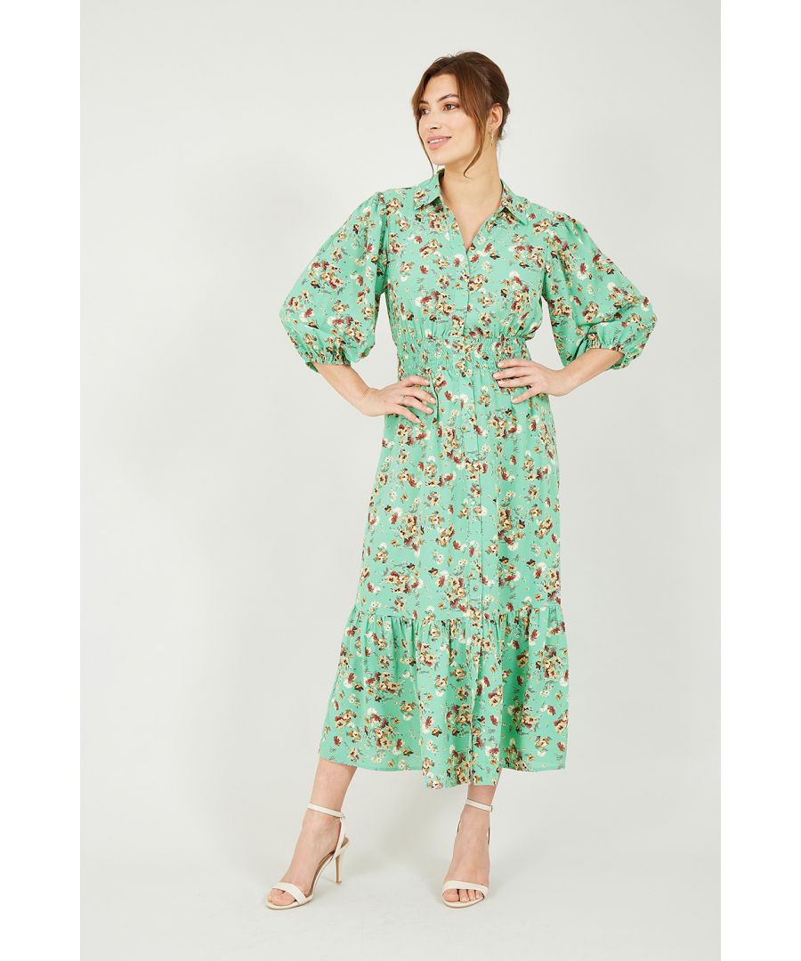 Our Floral midi dress is delicate and understated. This dress is the epitome of versatility and elegance.  Designed with an empire waist to flatter, a shirt style neckline for casual comfortability, and 3/4 sleeves. Perfect for your holiday getaway to Tuscany, pair with your favourite sandals and bag.
