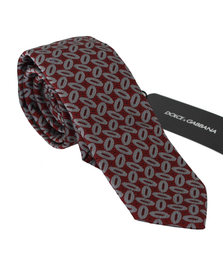 Dolce & Gabbana Neck Tie\nAbsolutely stunning, 100% Authentic, brand new with tags Dolce & Gabbana exclusive tie. This item comes from the exclusive Dolce & Gabbana collection.\nColor: Red Printed\nMaterial: 100% Silk\nWidth: 6 cm\nMade In Italy